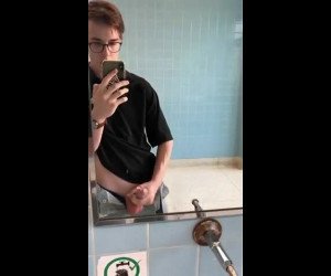 nerdy twink jerking off in public restroom